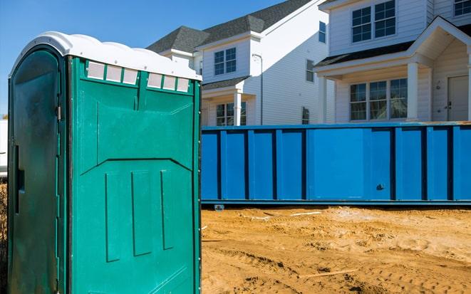 dumpster and portable toilet at a construction site in Antelope CA